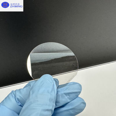 Wafer al carburo di silicio Dimensione personalizzata Semi isolante Wafer al SiC Quasi incolore Trasparente Resistenza ad alta pressione
